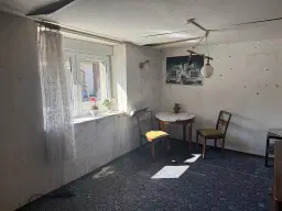 Vakwerkhuis met verpachte garages naast Löbau, Niedercunnersdorf - Duitsland