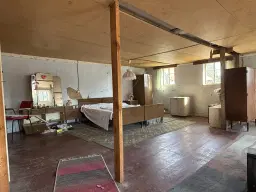 Vakwerkhuis met verpachte garages naast Löbau, Niedercunnersdorf - Duitsland