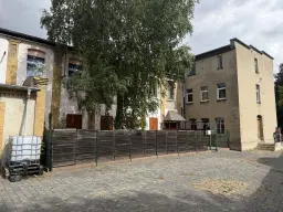 14 woningen (4 verhuurd, huursom = € 6.060,00) met 2.487 m² perceelgrootte, Zörbig, Leipzig – Duitsland