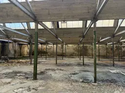 Voormalige textielfabriek op perceel van 5.493 m² - Walddorf- Duitsland
