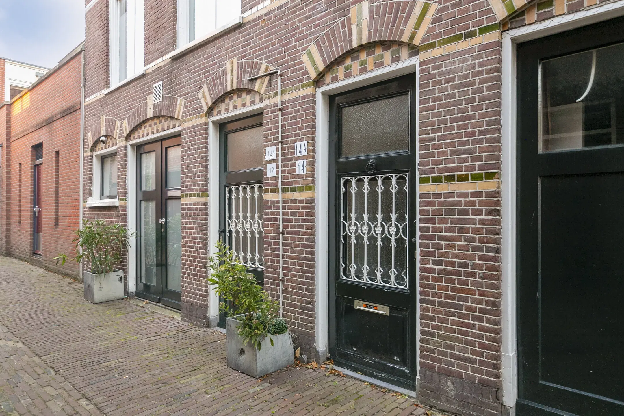 Leiden, Nieuwebrugsteeg 14 en 14A